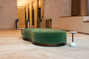 Rounded custom millwork seating in lobby