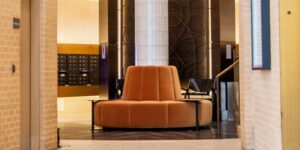 orange circular custom dining banquette in lobby