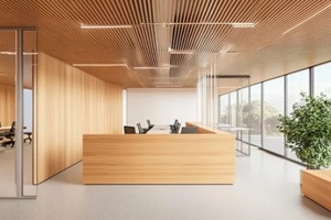 modern office reception with wooden interior and glass meeting room