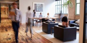 business people at work in a busy luxury office space